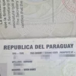 Cayó en Ezeiza un chino acusado de estafas cripto en Nigeria: llegó en un vuelo desde París con un pasaporte trucho de Paraguay