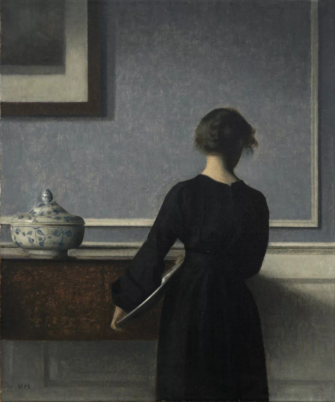 'Interior, mujer vista de espaldas', de Vilhelm Hammershøi, hacia 1904.