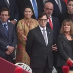 Puigdemont intenta convertir a Illa en Mazón por asistir al 12-O en Madrid en plena gota fría en Cataluña